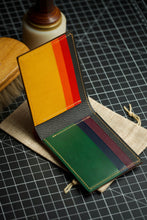 Load image into Gallery viewer, Eight Pocket Traditional Bifold - Horween Ultraviolet Shell Cordovan, Rainbow Buttero &amp; Black Chèvre
